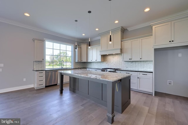 kitchen with a sink, stove, dishwasher, and ornamental molding