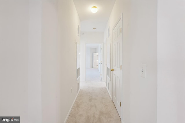 corridor with light carpet