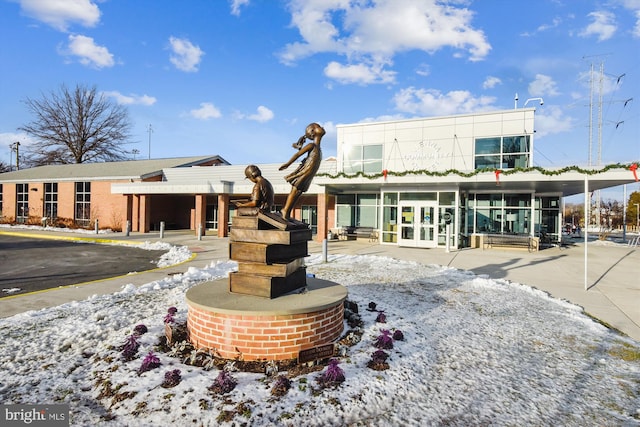 view of snow covered building