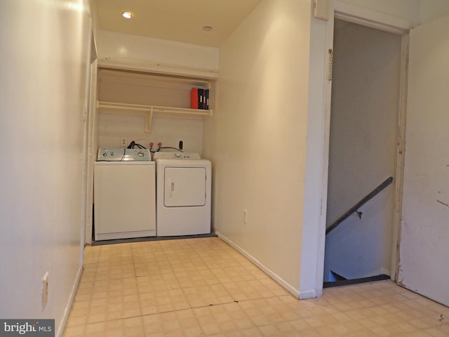 laundry room with washer and clothes dryer