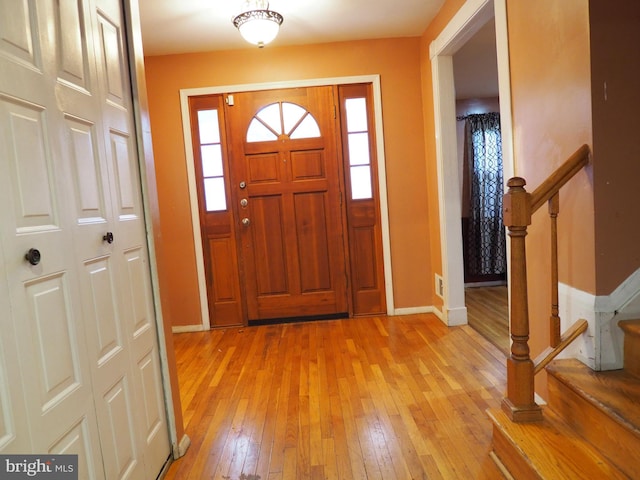 foyer with light hardwood / wood-style flooring