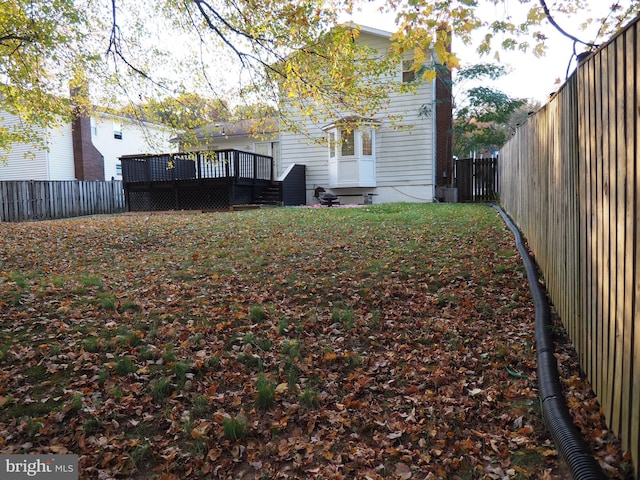 view of yard with a deck