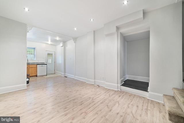 unfurnished living room with light hardwood / wood-style flooring