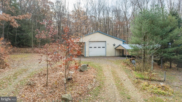 garage featuring a carport