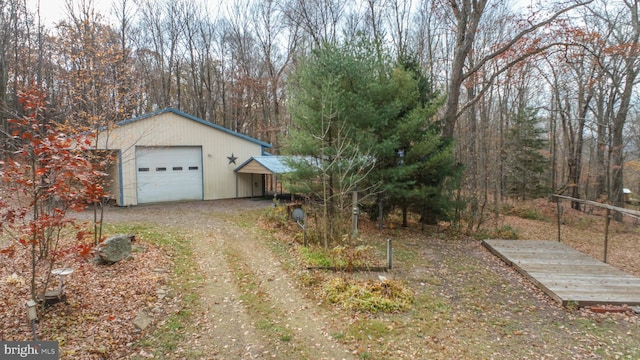 view of yard with a garage