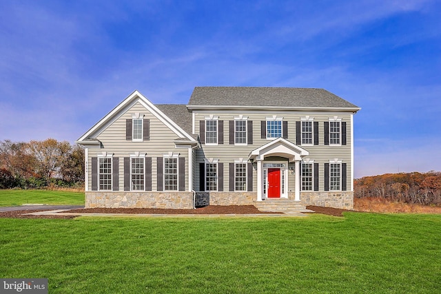 view of front of house with a front lawn