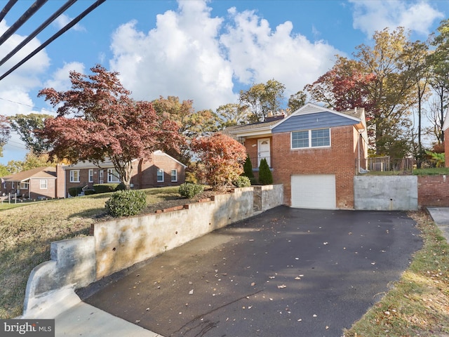 view of front of home featuring a garage