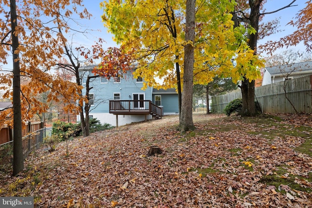 view of yard featuring a deck