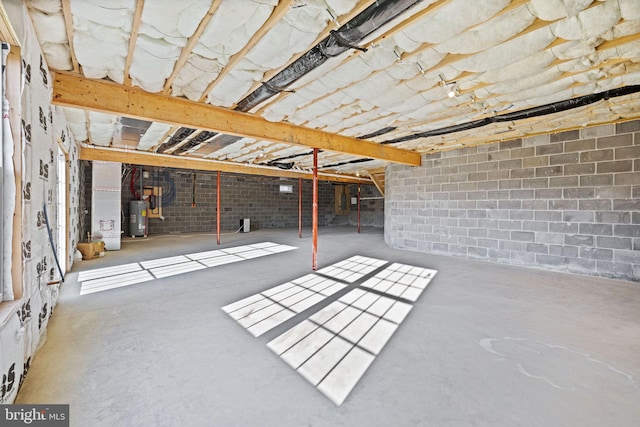 interior space with water heater and heating unit