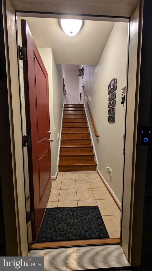 interior space featuring light tile patterned flooring