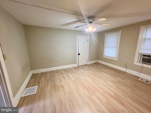 spare room with ceiling fan and light hardwood / wood-style flooring