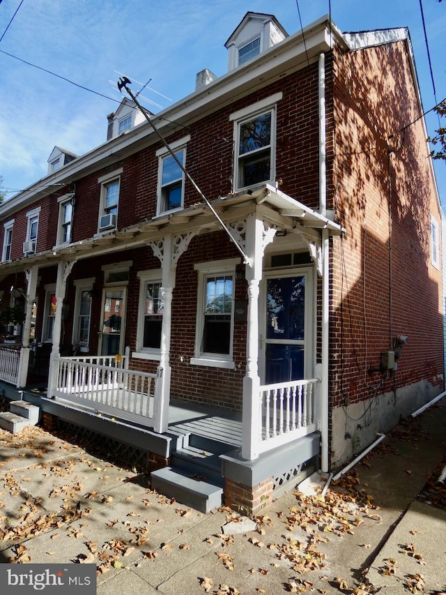 view of property with a porch