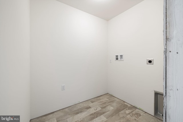 laundry area with hookup for a washing machine and hookup for an electric dryer