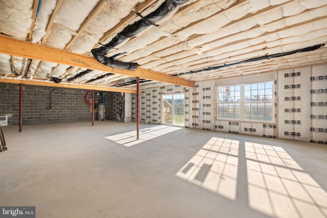 basement featuring electric water heater