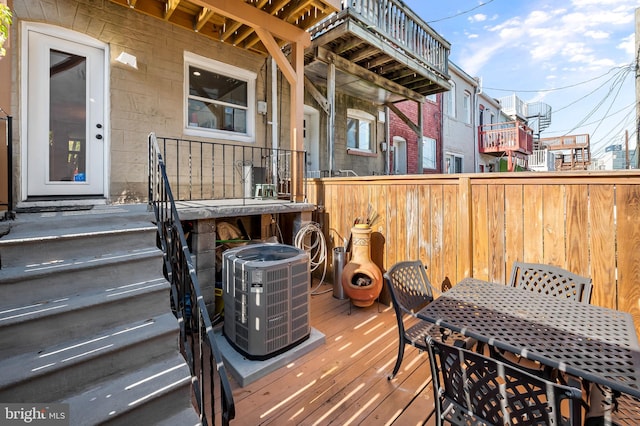 wooden terrace featuring central AC