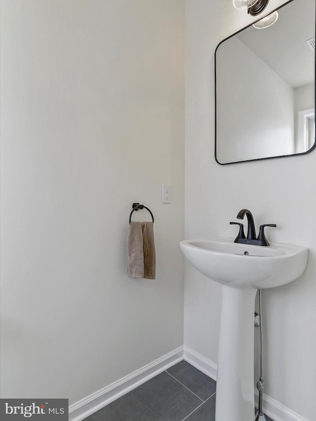 bathroom with tile patterned flooring