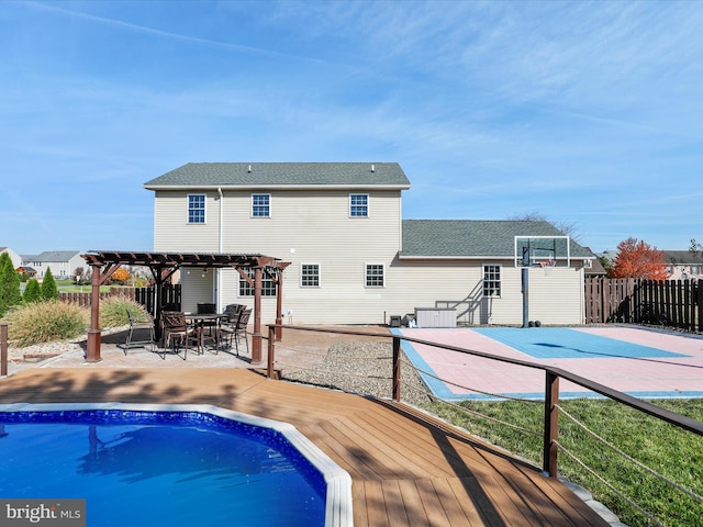 view of swimming pool featuring a pergola and a patio area