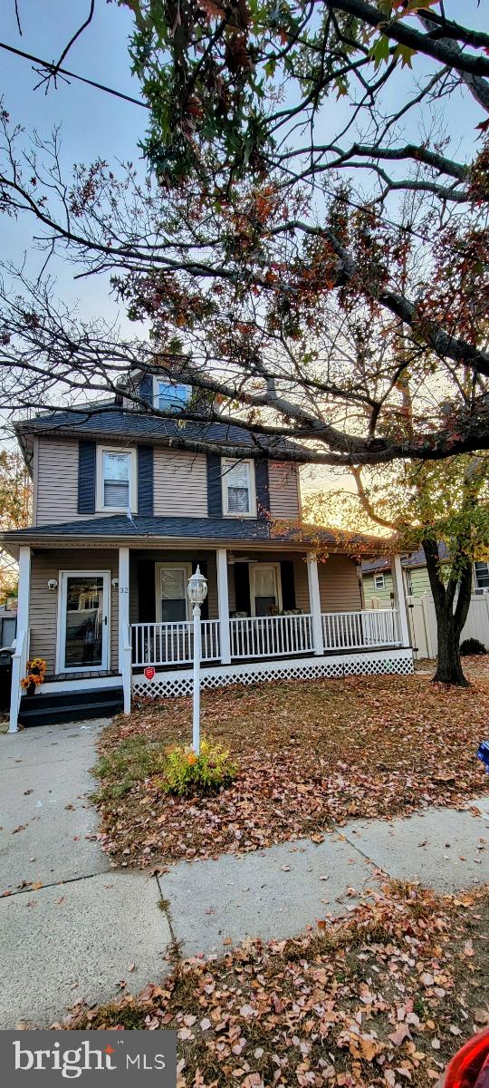 view of front of home featuring covered porch