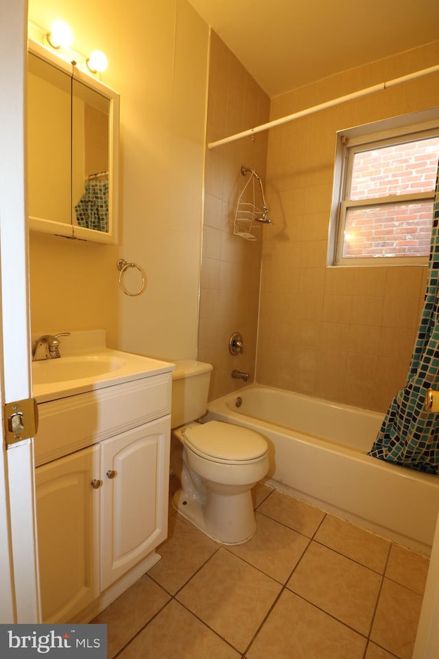 full bathroom featuring vanity, shower / tub combo, toilet, and tile patterned flooring