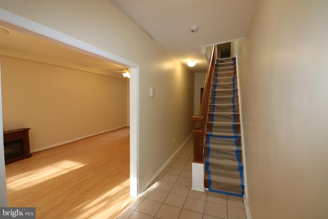 403 O St NW, Washington, DC 20001 - stairs featuring ceiling fan, baseboards, and tile patterned floors