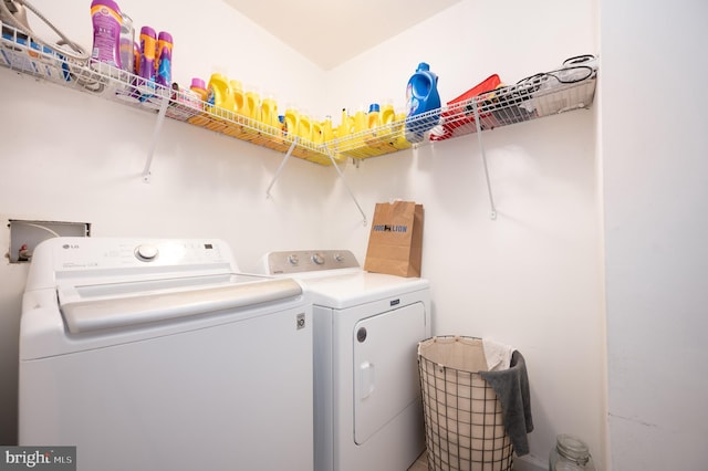 laundry room featuring washing machine and dryer