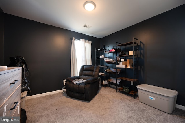 sitting room with light carpet