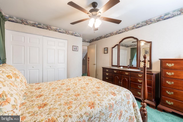 bedroom with carpet floors, a closet, and ceiling fan