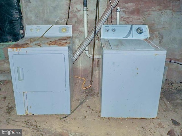 laundry room with washer and dryer