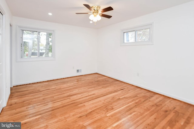 unfurnished room featuring light hardwood / wood-style flooring and ceiling fan