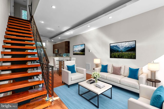 living room with hardwood / wood-style flooring