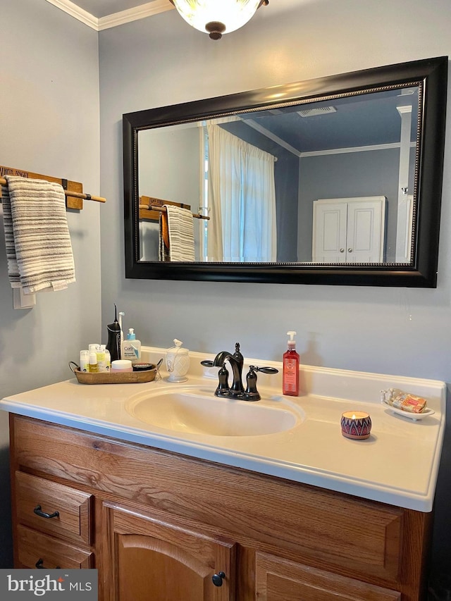 bathroom featuring vanity and crown molding