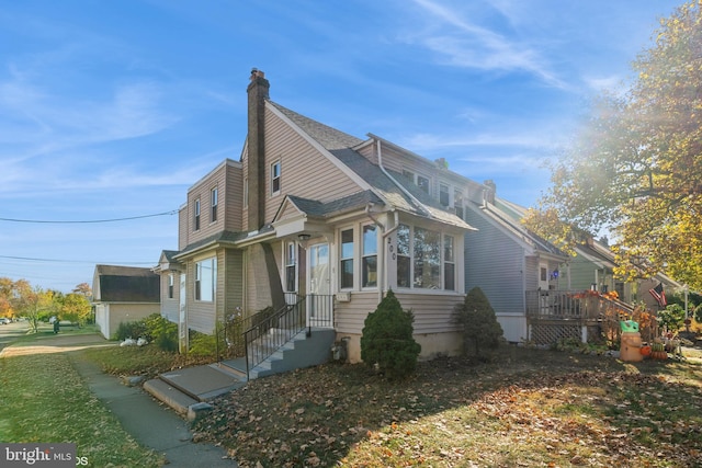 view of side of home with a garage