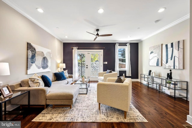 living room with ceiling fan, french doors, dark wood-type flooring, and ornamental molding