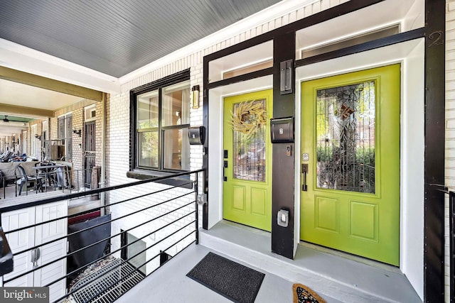 property entrance featuring covered porch