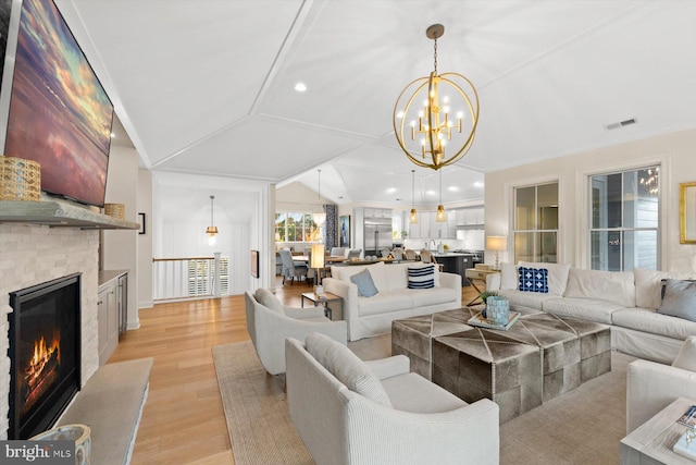 living room with light hardwood / wood-style floors and lofted ceiling