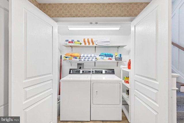 laundry area featuring separate washer and dryer