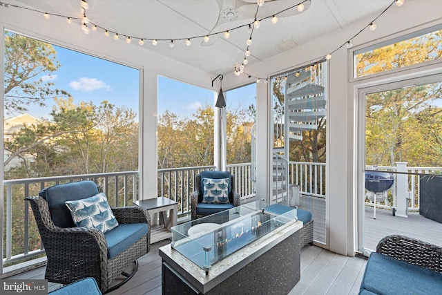 sunroom / solarium featuring plenty of natural light