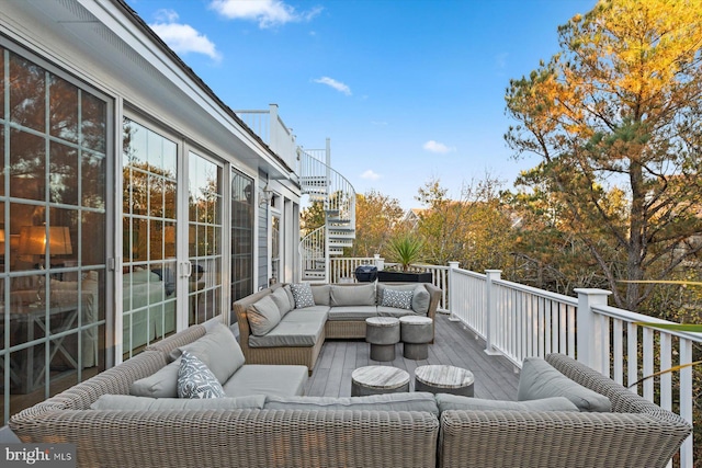 wooden deck with an outdoor hangout area