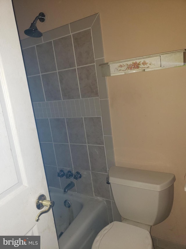 full bathroom with toilet and shower / bathtub combination