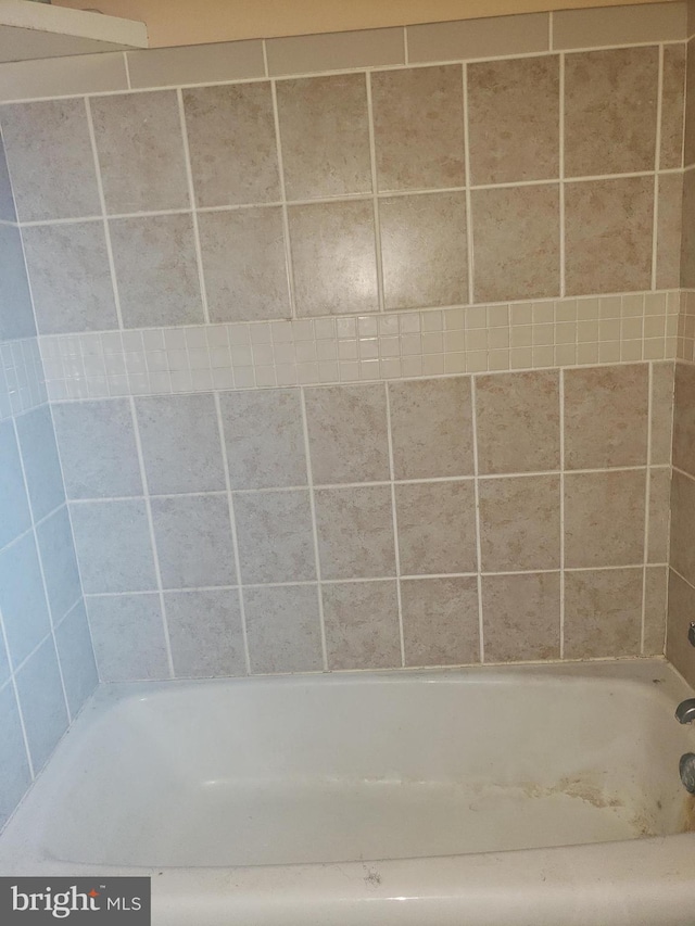bathroom featuring a tub
