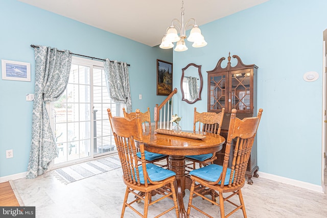 dining room featuring a notable chandelier