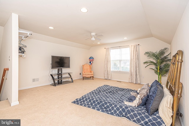 bedroom featuring carpet floors, vaulted ceiling, and ceiling fan