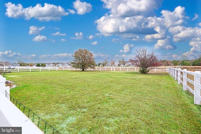 view of yard featuring a rural view