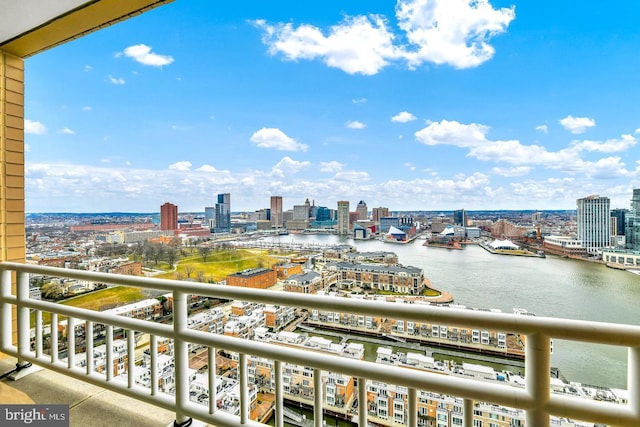 balcony featuring a water view