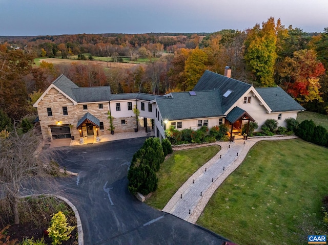 view of front of house featuring a yard