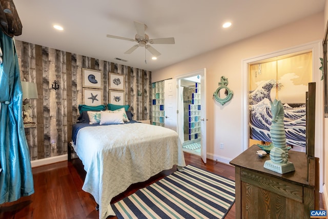 bedroom with dark wood-type flooring and ceiling fan