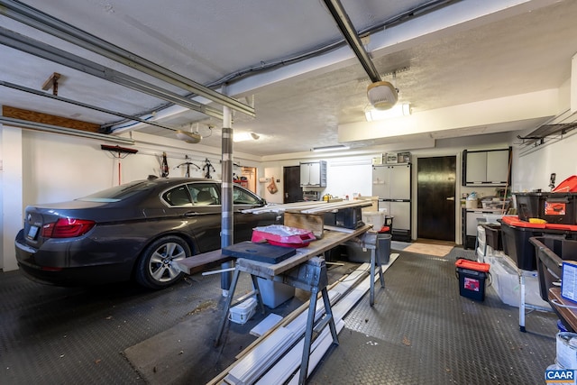 garage with white fridge