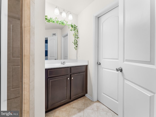 bathroom featuring vanity and tile patterned flooring