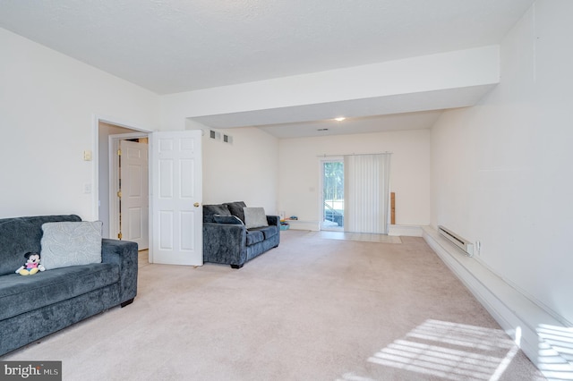 living room featuring baseboard heating and light colored carpet