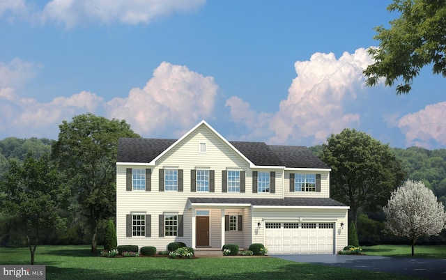 view of front of house featuring a front lawn and a garage